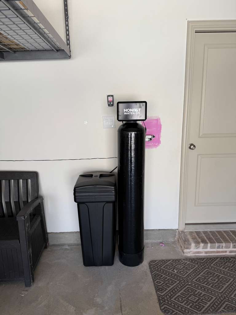 Water softener and brine tank installed in an Ottawa home basement