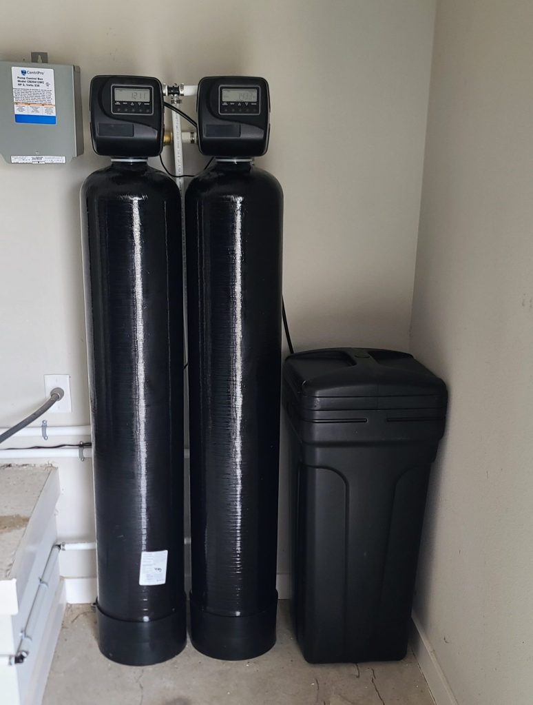 Finished whole-home filtration and softening installation in an Ottawa basement